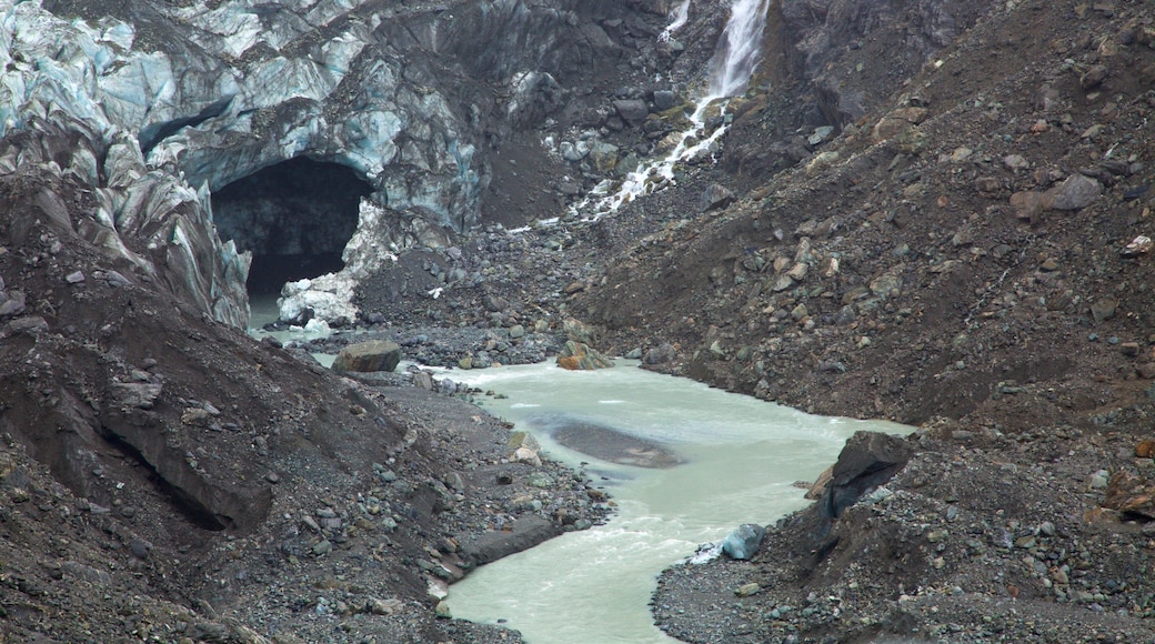 Fox Glacier featuring a river or creek and mountains