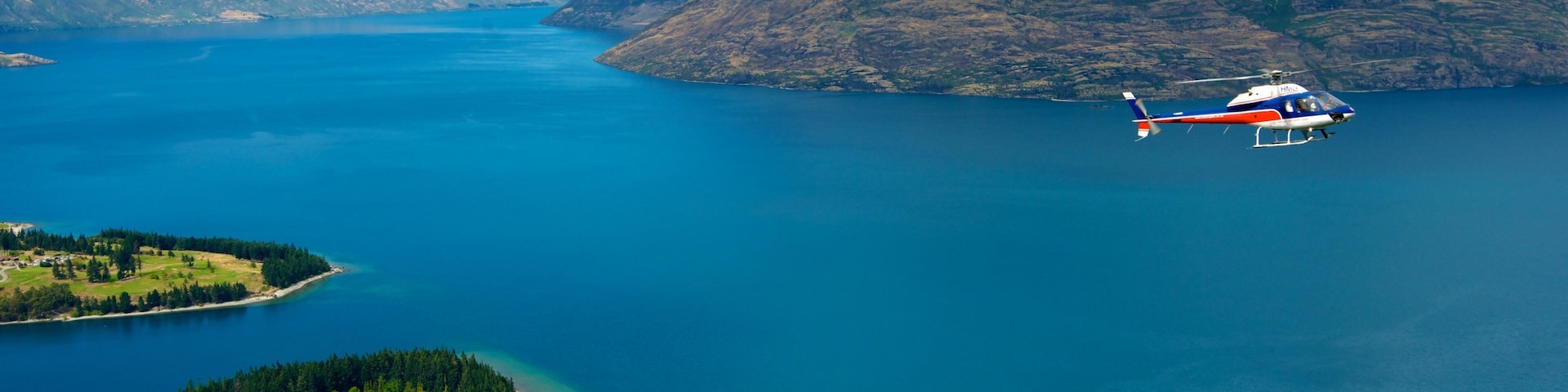 Bob\'s Peak featuring an aircraft, mountains and general coastal views