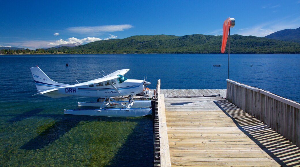 Lake Te Anau showing a lake or waterhole and aircraft