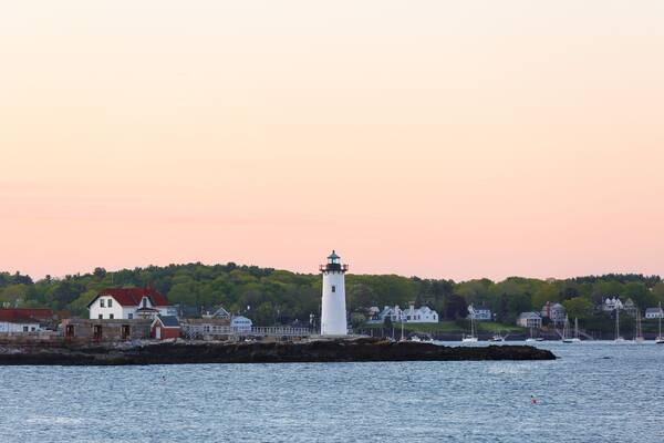 Portsmouth Harbor Lighthouse after sunset. The lighthouse is a historic lighthouse located within Fort Constitution in New Castle, New Hampshire, United States.