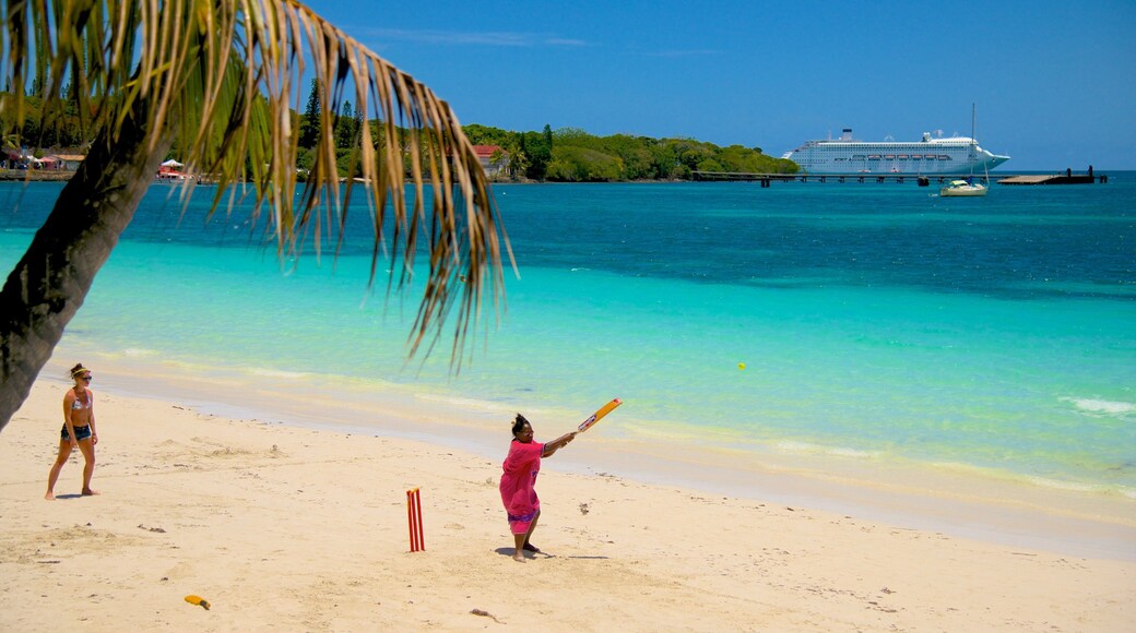 Kuto Beach which includes a beach as well as a small group of people