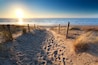 path to sand beach in North sea, Zandvoort aan zee, North Holland, NEtherlands; Shutterstock ID 180884936