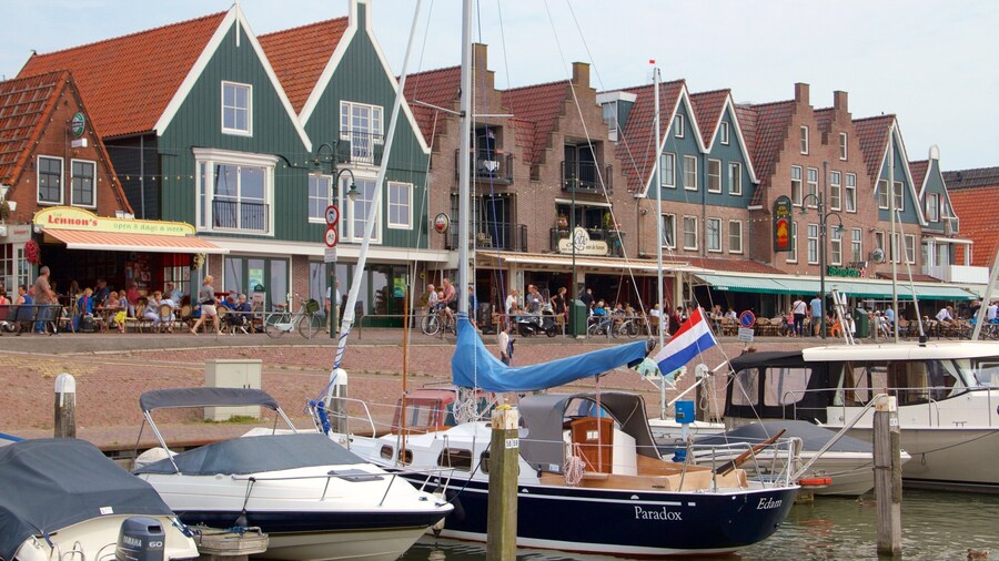 Volendam Harbour showing a coastal town, a bay or harbor and boating