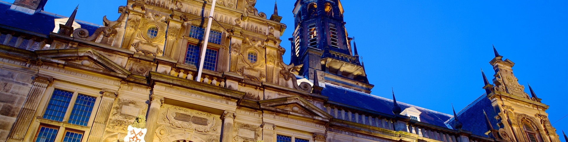 Stadhuis which includes an administrative buidling, a sunset and heritage architecture