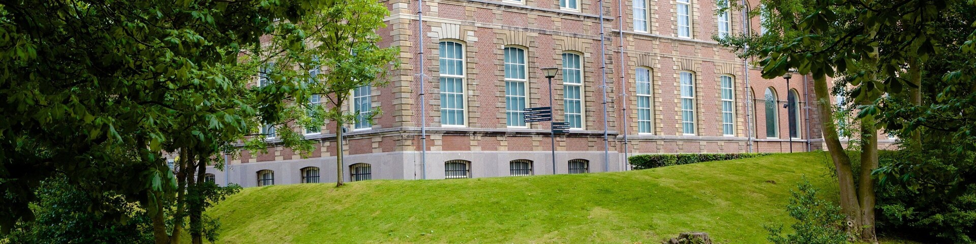 National Museum of Ethnology featuring boating and a river or creek as well as a small group of people