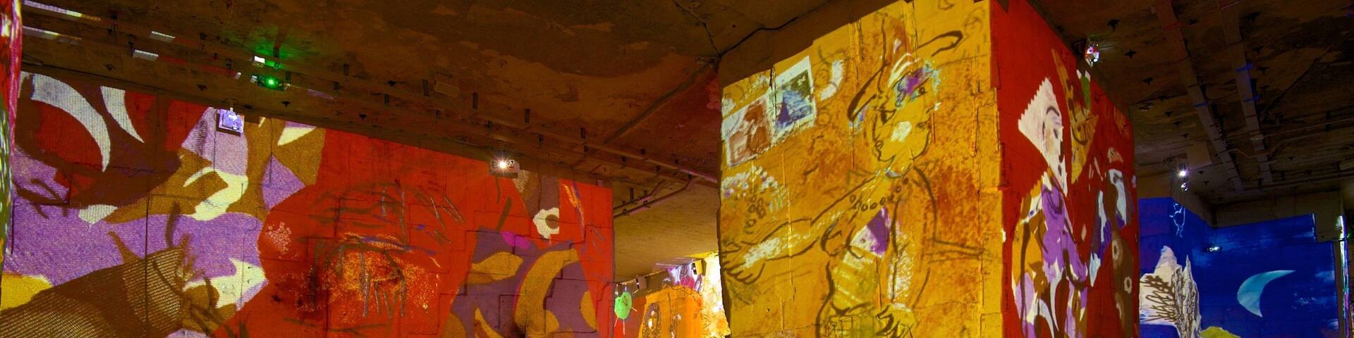 Carrieres de Lumieres which includes a church or cathedral, art and interior views