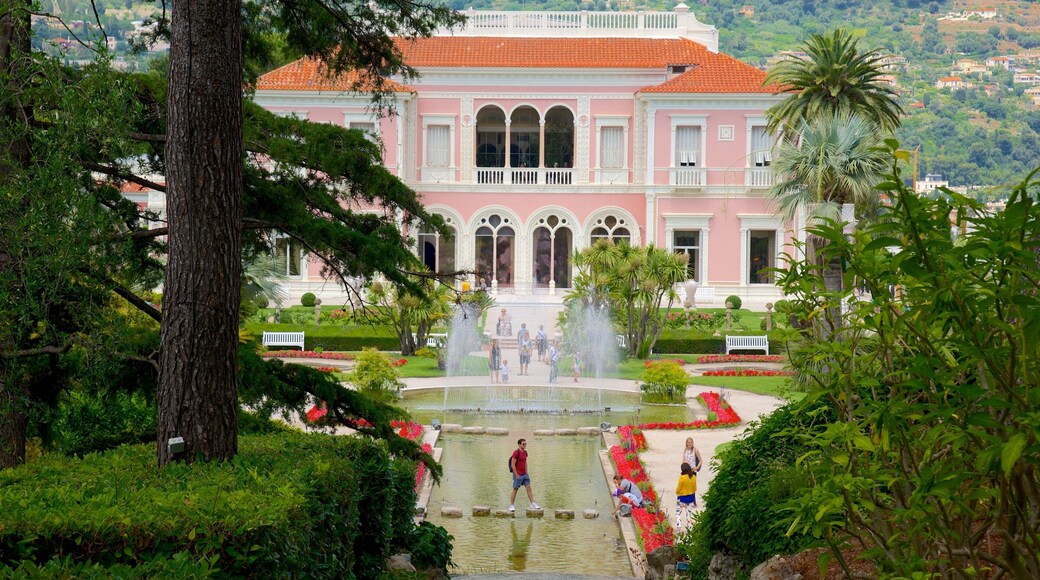 Villa Ephrussi which includes a castle, heritage architecture and a fountain