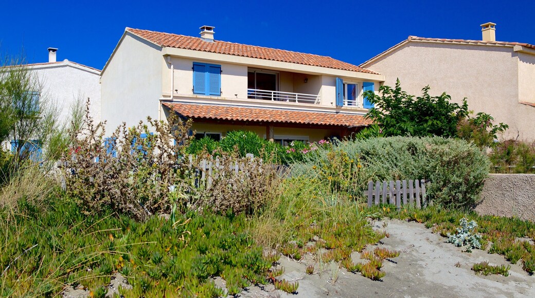 La Marana Beach featuring a house