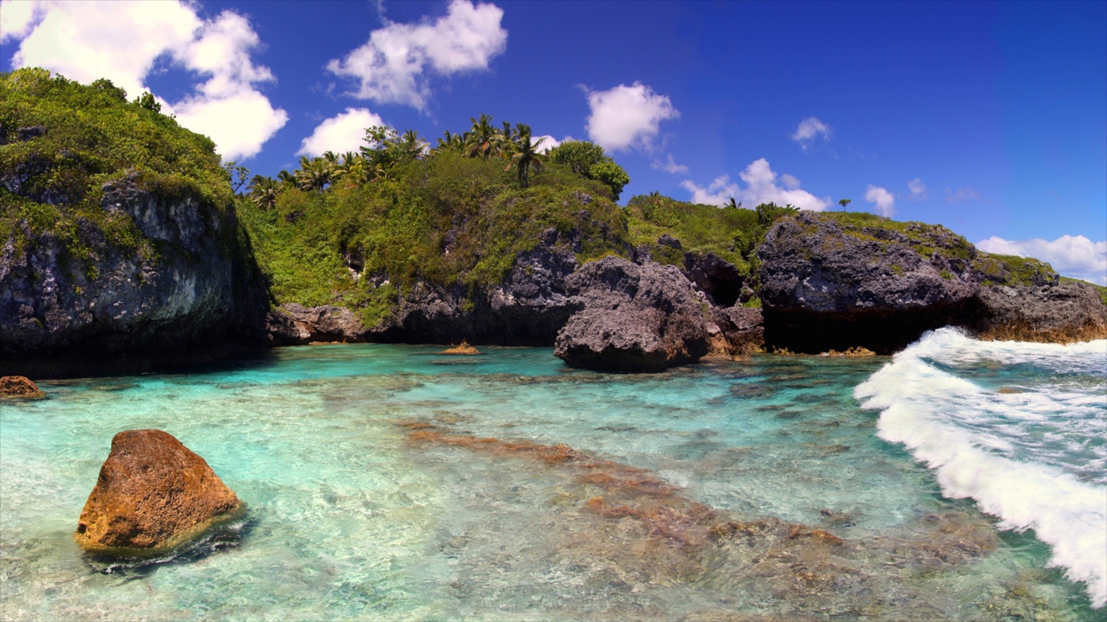 Limu showing rocky coastline and colorful reefs