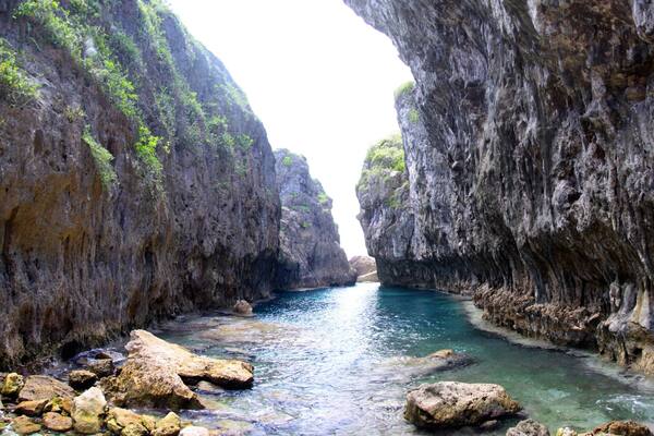 Matapa Chasm featuring rugged coastline and a gorge or canyon