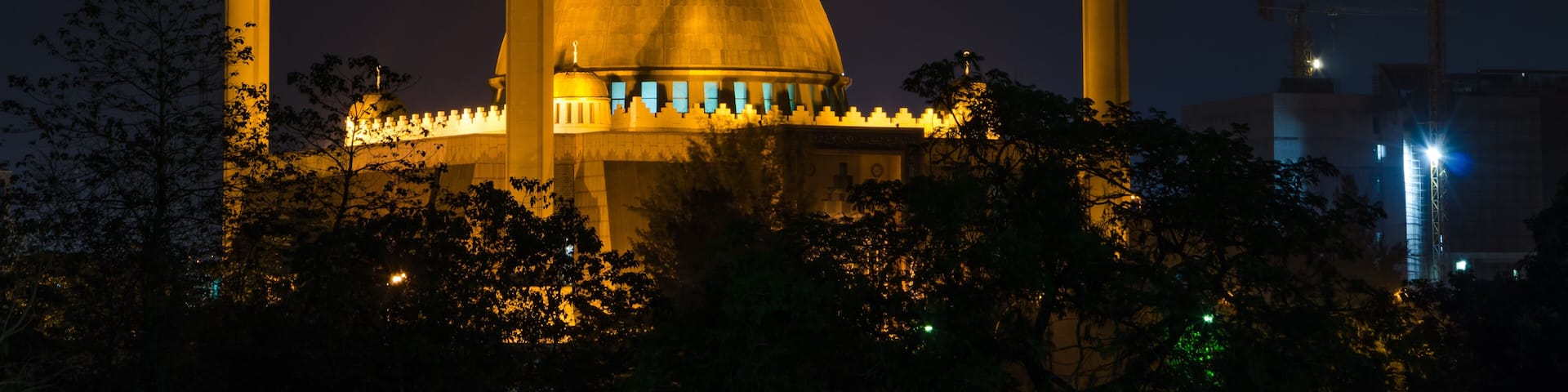 The National Mosque of Abuja illuminated during the night