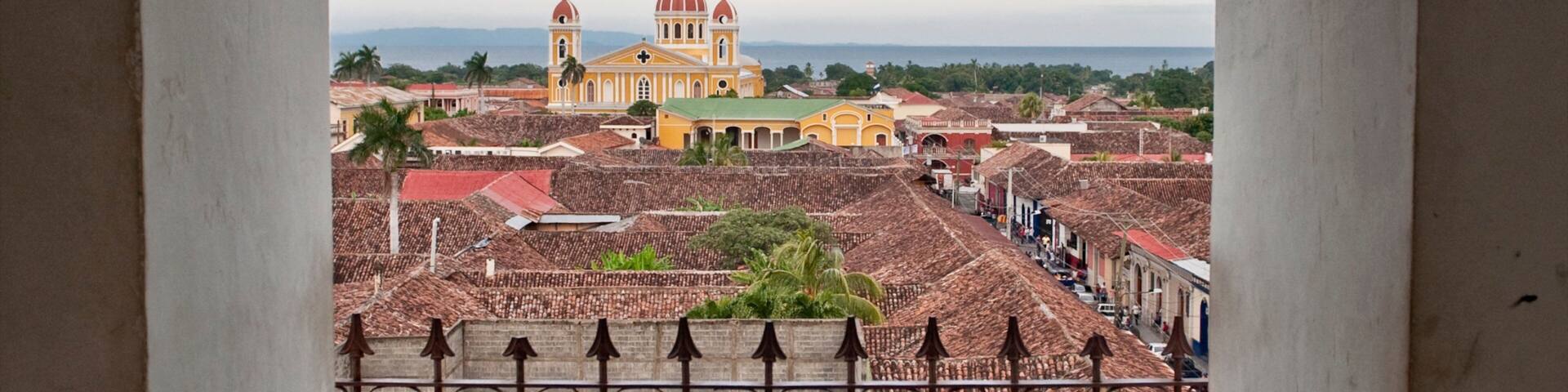 Granada Cathedral featuring interior views, a church or cathedral and a city