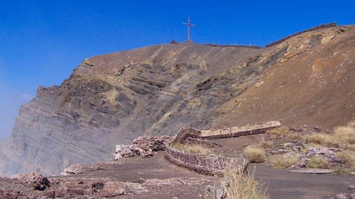 Masaya is located 20 km south of Managua, Nicaragua. It is Nicaragua's first and largest National Park. As you can see off to the left, it is quietly letting you know it's there. If your eyesight is bad, your nose will let you know it too!!