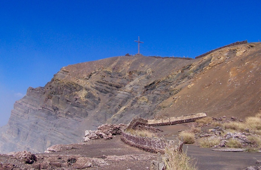 Masaya is located 20 km south of Managua, Nicaragua. It is Nicaragua's first and largest National Park. As you can see off to the left, it is quietly letting you know it's there. If your eyesight is bad, your nose will let you know it too!!