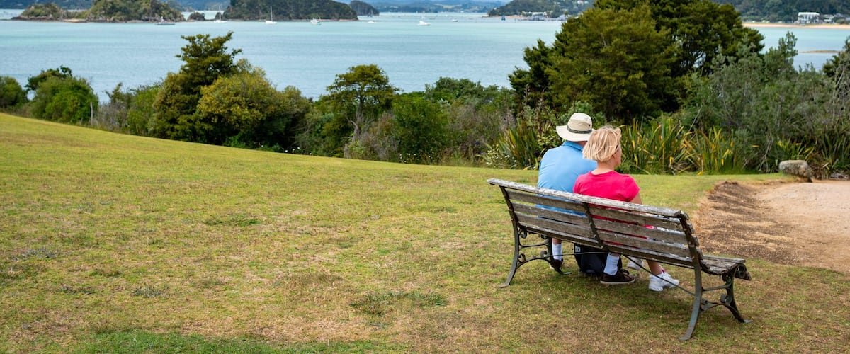 Waitangi Treaty Grounds which includes general coastal views and a park as well as a couple