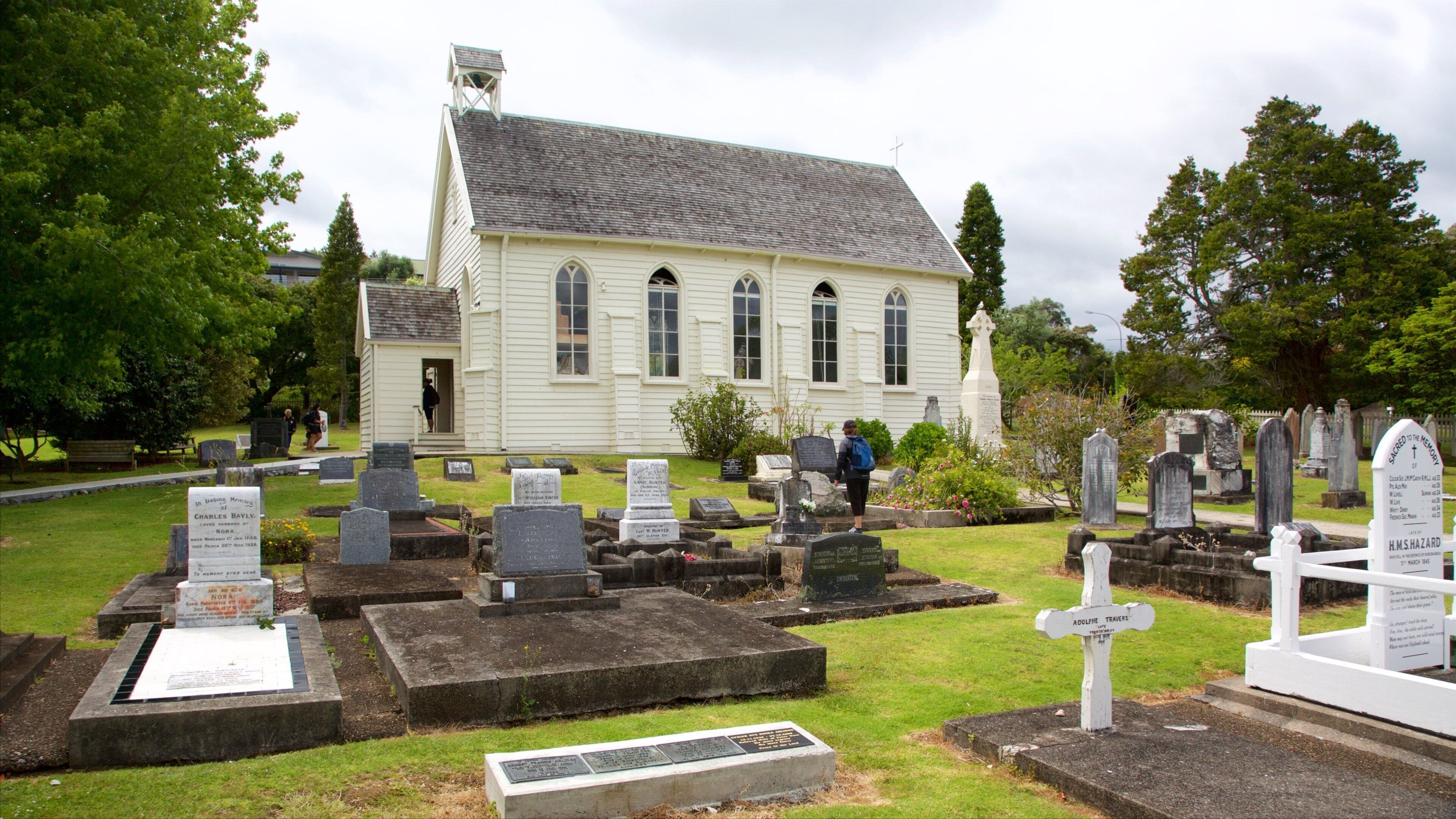 Russell Christ Church featuring a church or cathedral and a cemetery