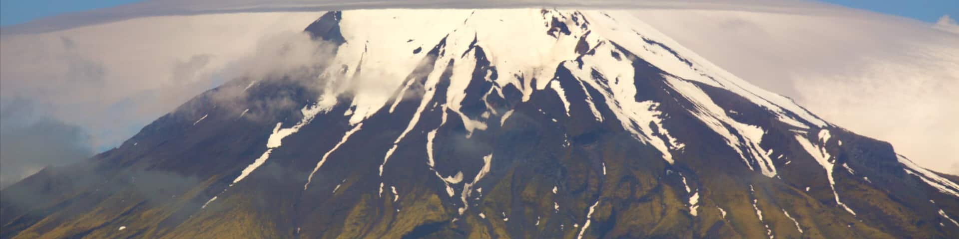 Cape Egmont Lighthouse which includes mountains and snow
