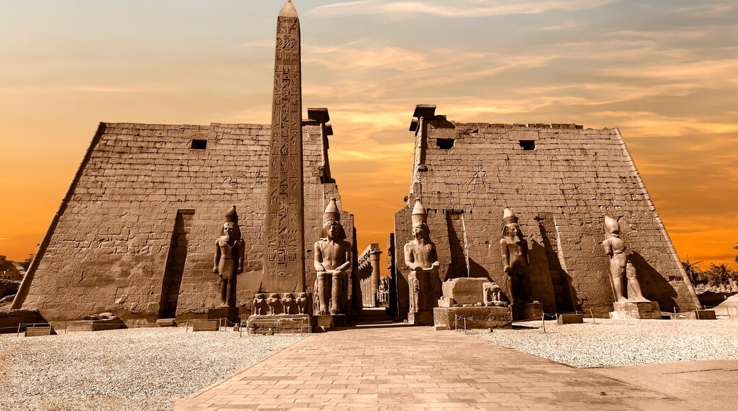 Entrance to Luxor Temple at sunset, a large Ancient Egyptian temple complex located on the east bank of the Nile River in the city today known as Luxor (Thebes). Was consecrated to the god Amon-Ra