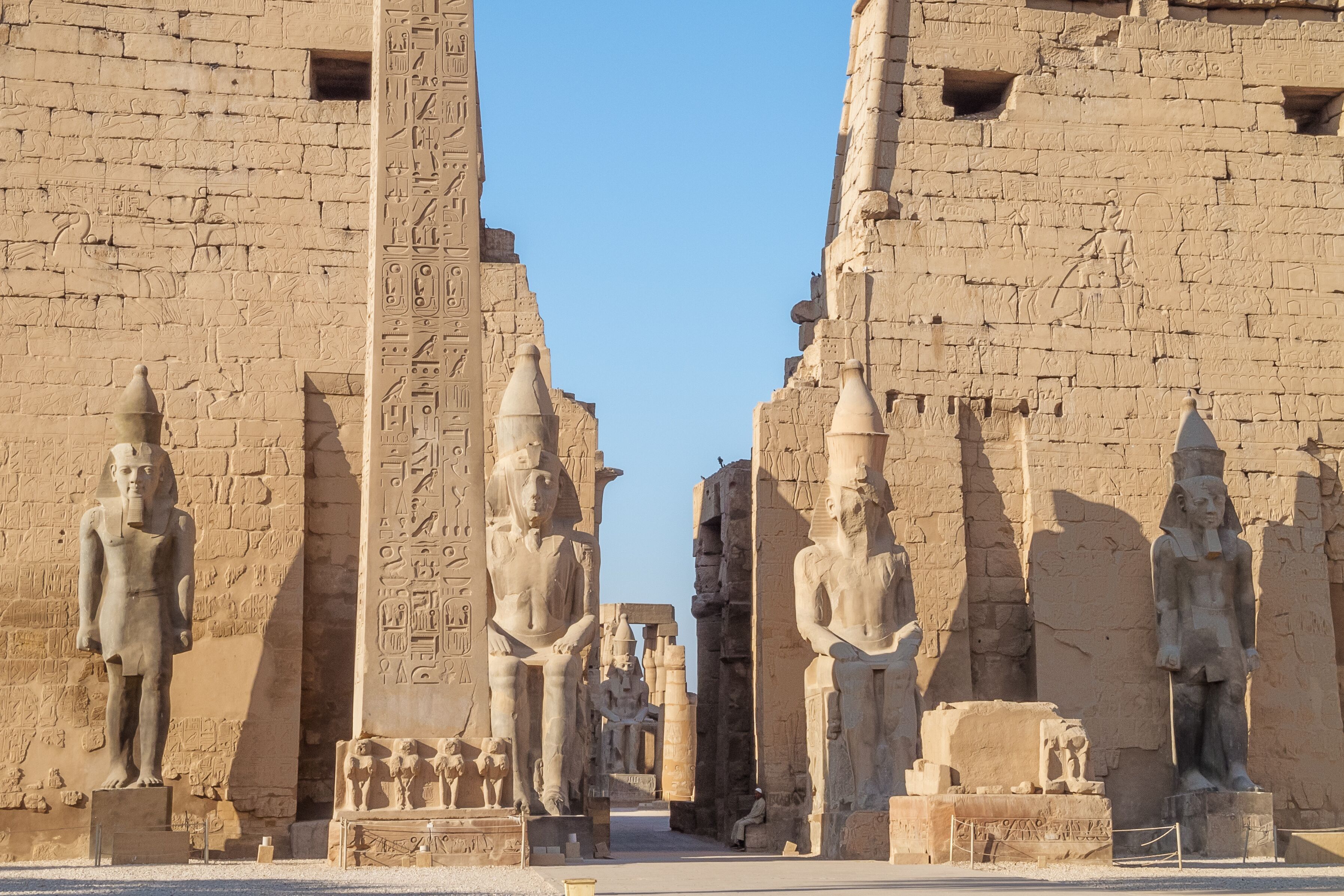Standing at the entrance of the Temple of Luxor before the sttues of Ramesses II