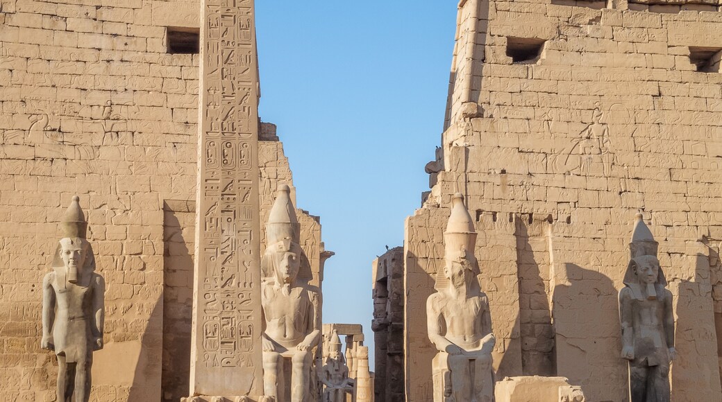 Standing at the entrance of the Temple of Luxor before the sttues of Ramesses II