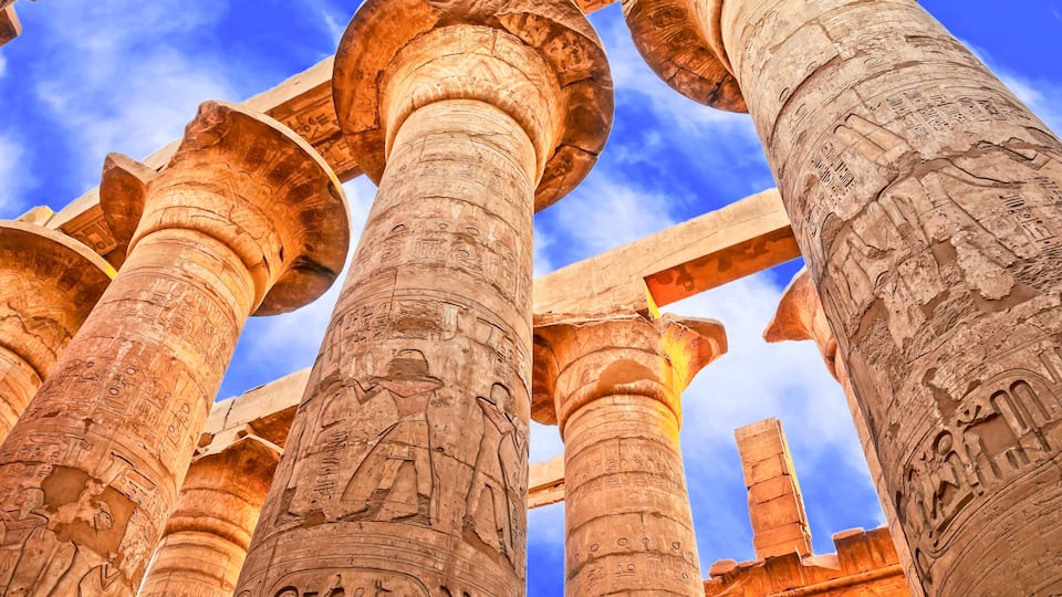Great Hypostyle Hall and clouds at the Temples of Karnak (ancient Thebes). Luxor, Egypt