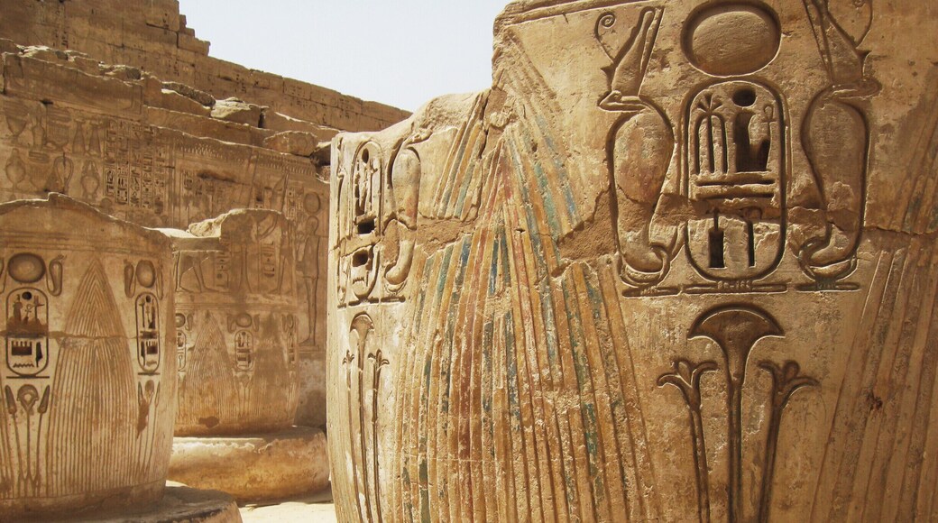 What remains of giant columns at Medinet Habu, with the name of Ramesses Hekaiunu, the last of the great pharaohs, inscribed on them. #architecture