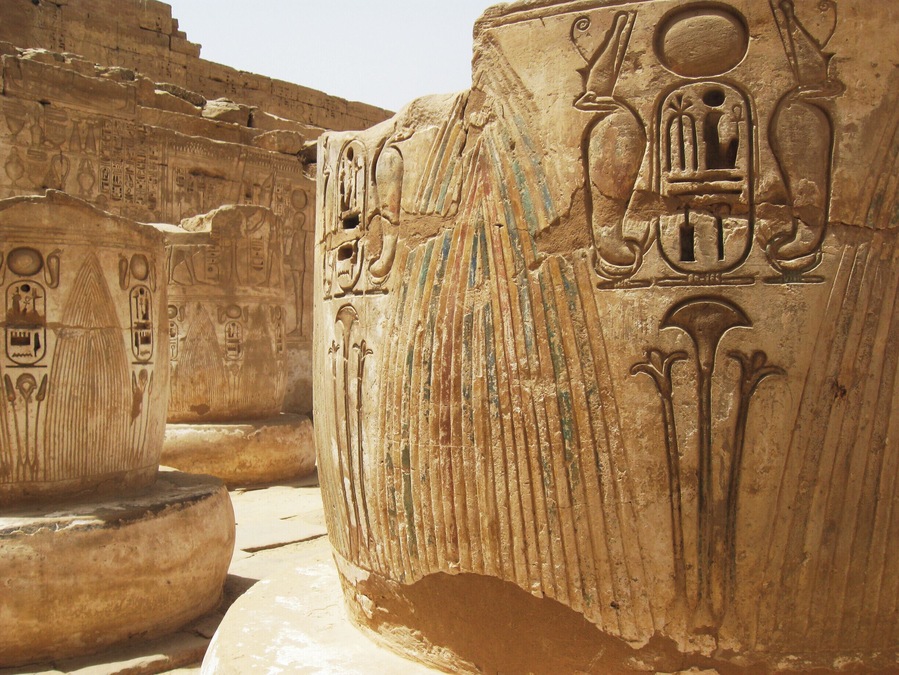 What remains of giant columns at Medinet Habu, with the name of Ramesses Hekaiunu, the last of the great pharaohs, inscribed on them. #architecture