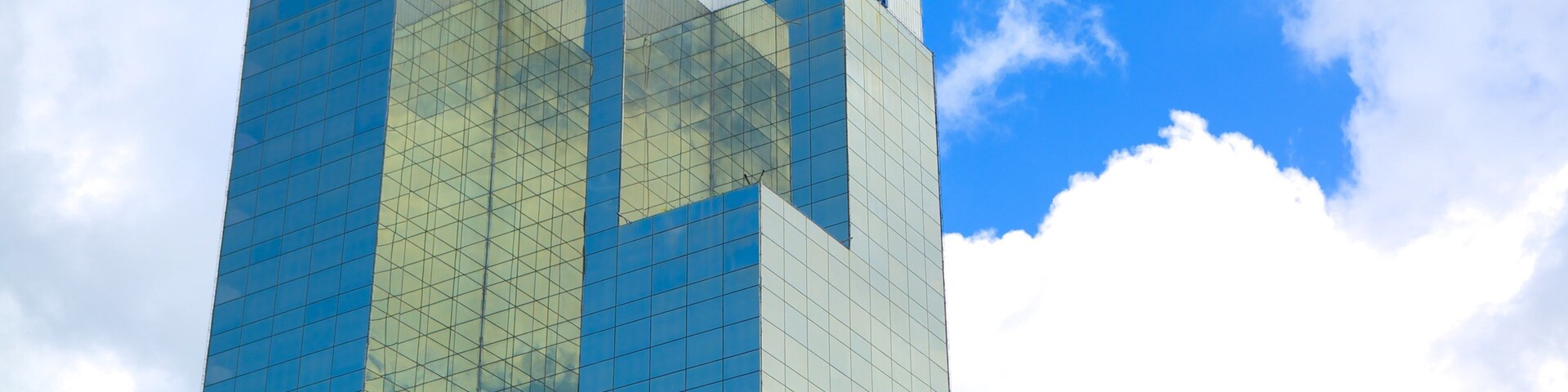 Torre Cuscatlan featuring city views, modern architecture and a high rise building