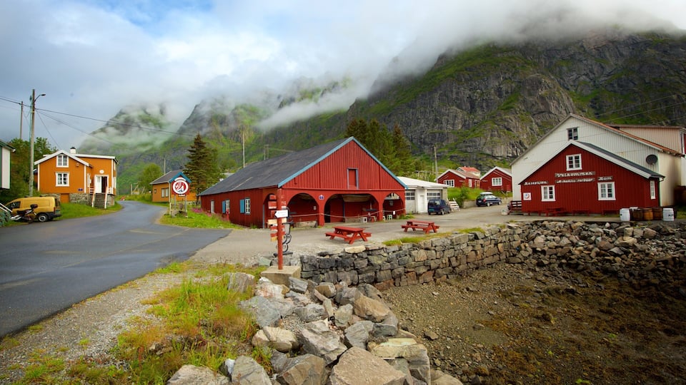A red building with a sign that reads "Welcome".