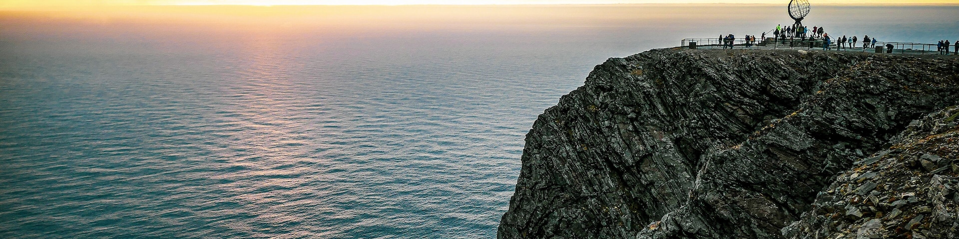 #Norway #northcape #outdoor #Trovember #view
First become famous after the English explorer Richard Chancellor rounded it in 1553 in an attempt to find a sea route through the northeast passage. Although branded northernmost point in Europe, it is not exactly true (that honor goes to Cape Nordkinn), although it is the most tourist friendly and during a clear sunrise it is certainly very impressive to see. The barren tundra that paints the area homes many if the wildlife unique within the #arctic circle which includes reindeers, and many species of arctic birds that lives on the islands near the area.
Since the northcape itself sits at the cloudlines, during cloudy winter days the area can be very foggy to the point that you can't even see anything right in front of you. Luckily there are camera installed in the vicinity which can be monitored online to see the condition there before visit. Also guest can enjoy the view in the comfort of their large visitor center that has many facility including festaurants, shoo, theater, and a small museum where tourist can stay warm and cozy while waiting for the perfect moment to see the beautiful north cape sunrise and truly feel like they are at the end of the world :)