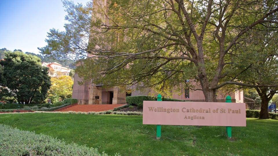 A sign for Wellington Cathedral of St Paul Anglican with a building in the background.