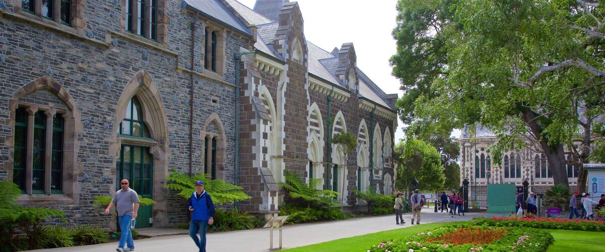 Canterbury Museum which includes a park and heritage architecture as well as a small group of people