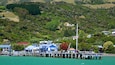 Akaroa Wharf showing general coastal views and a coastal town