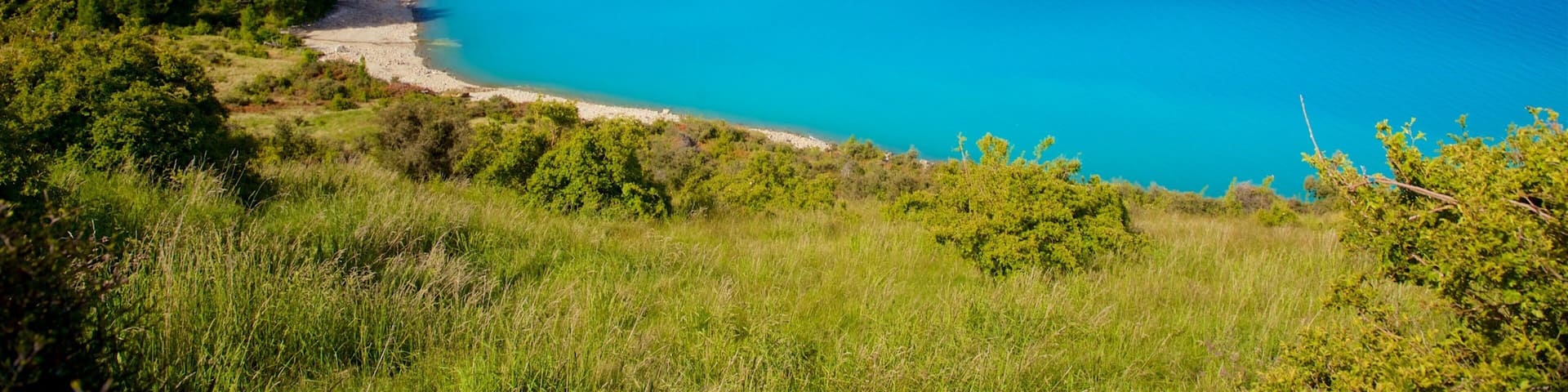 Lake Pukaki showing a lake or waterhole and tranquil scenes