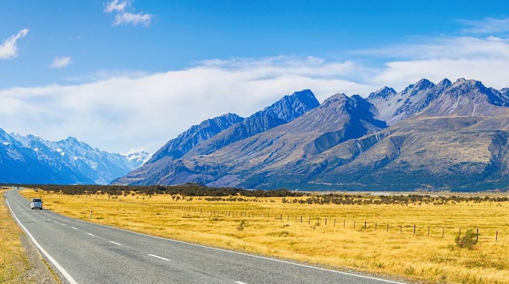 Picture panoramic view of car on the road go to Mt. Cook, New Zealand national park at South island new zealand