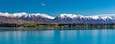 Lake Ruataniwha, New Zealand, South Island, trees and mountains, azure water reflections