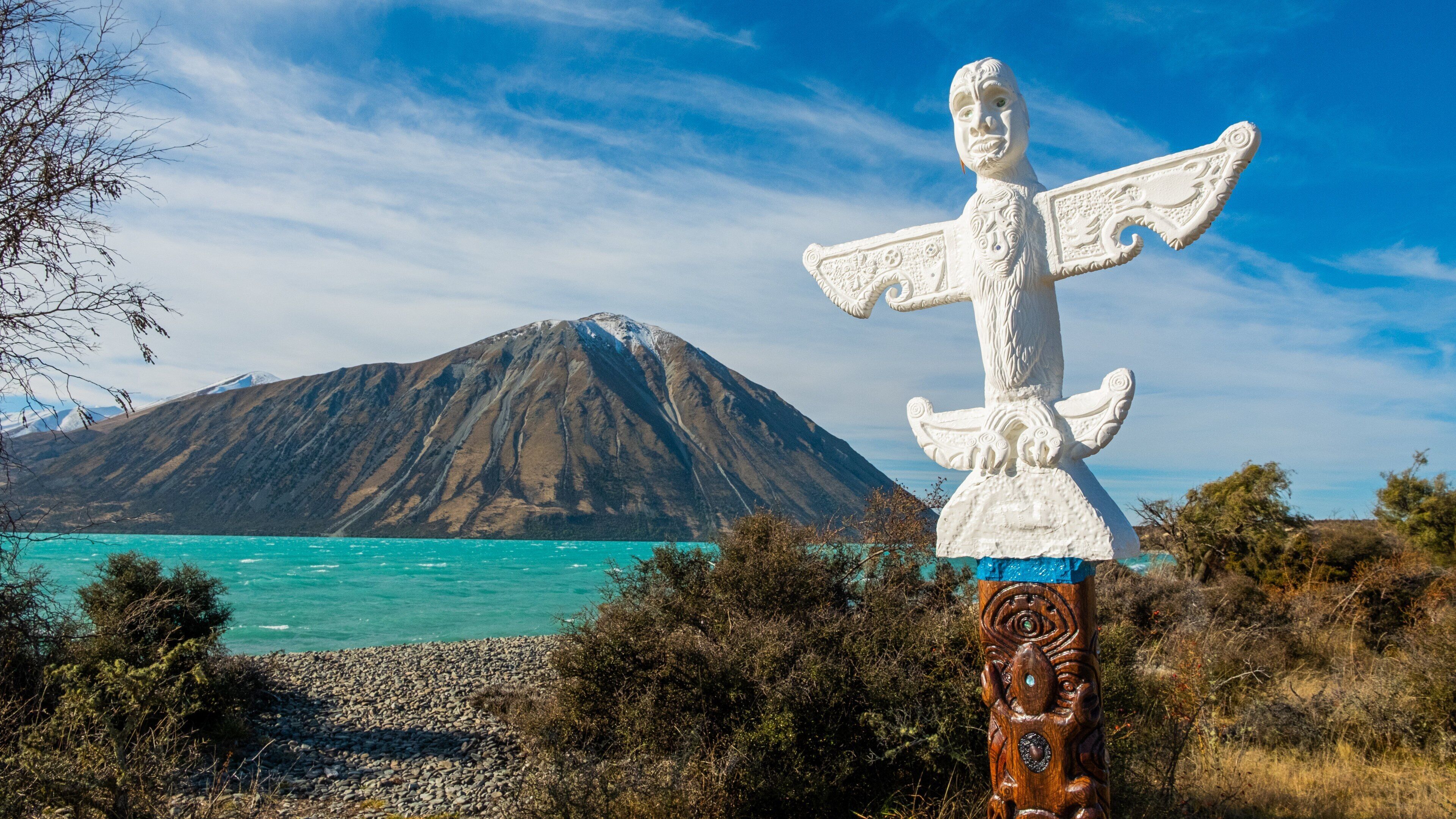 Lake Ohau which includes a lake or waterhole, indigenous culture and mountains