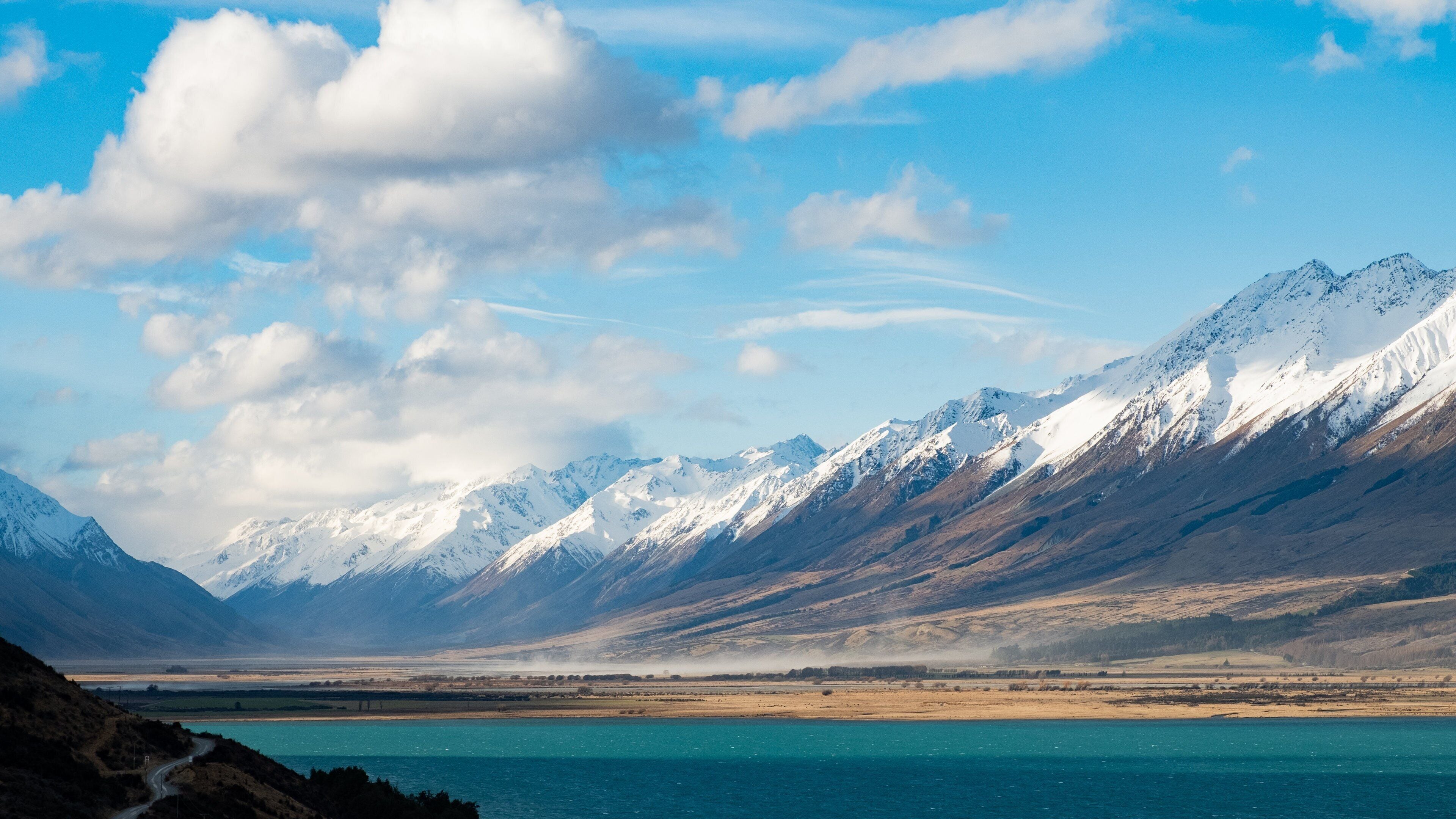 Lake Ohau showing mountains and a lake or waterhole
