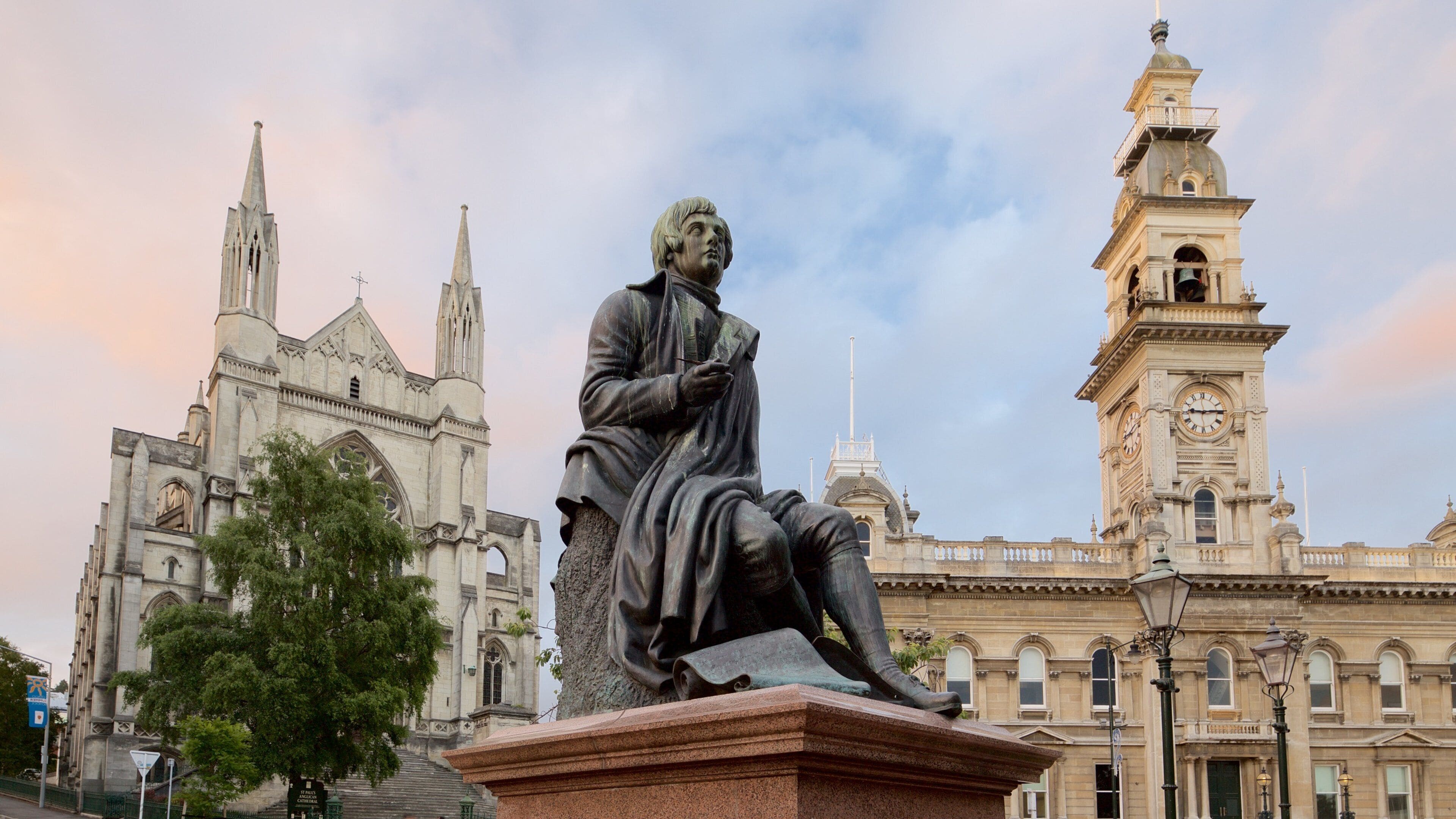 The Octagon showing a statue or sculpture, a church or cathedral and an administrative buidling