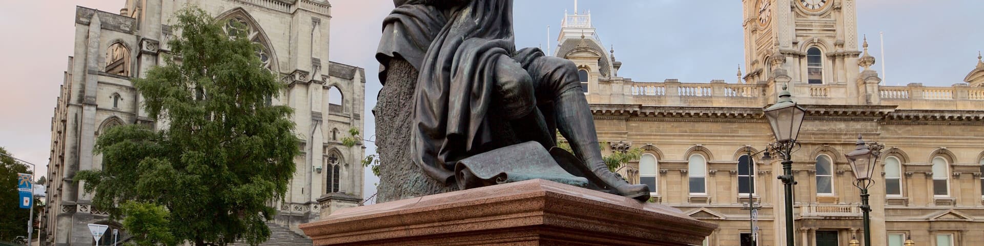 The Octagon showing a statue or sculpture, a church or cathedral and an administrative buidling