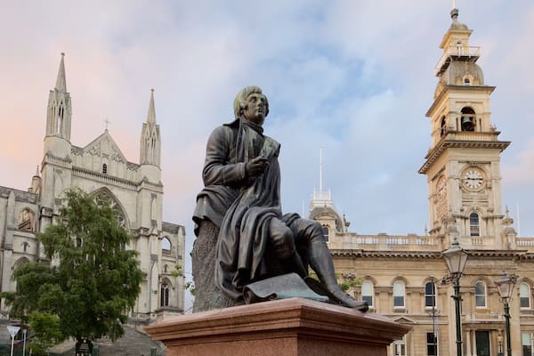 The Octagon showing a statue or sculpture, a church or cathedral and an administrative buidling