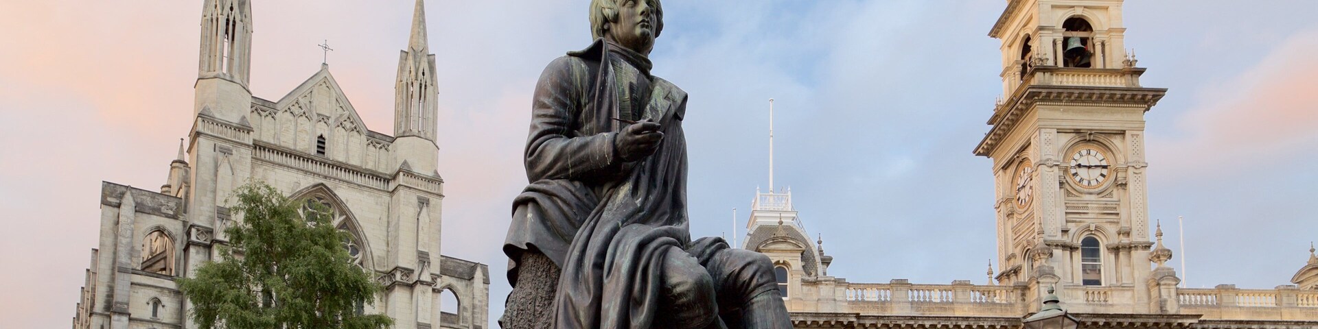 The Octagon showing a statue or sculpture, a church or cathedral and an administrative buidling