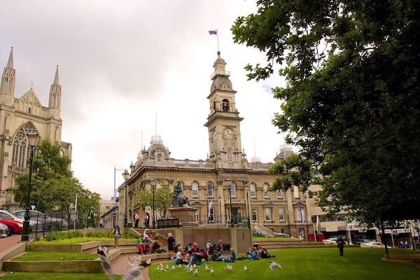 The Octagon which includes heritage elements and a church or cathedral as well as a large group of people