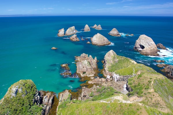 Nugget Point Lighthouse showing rocky coastline