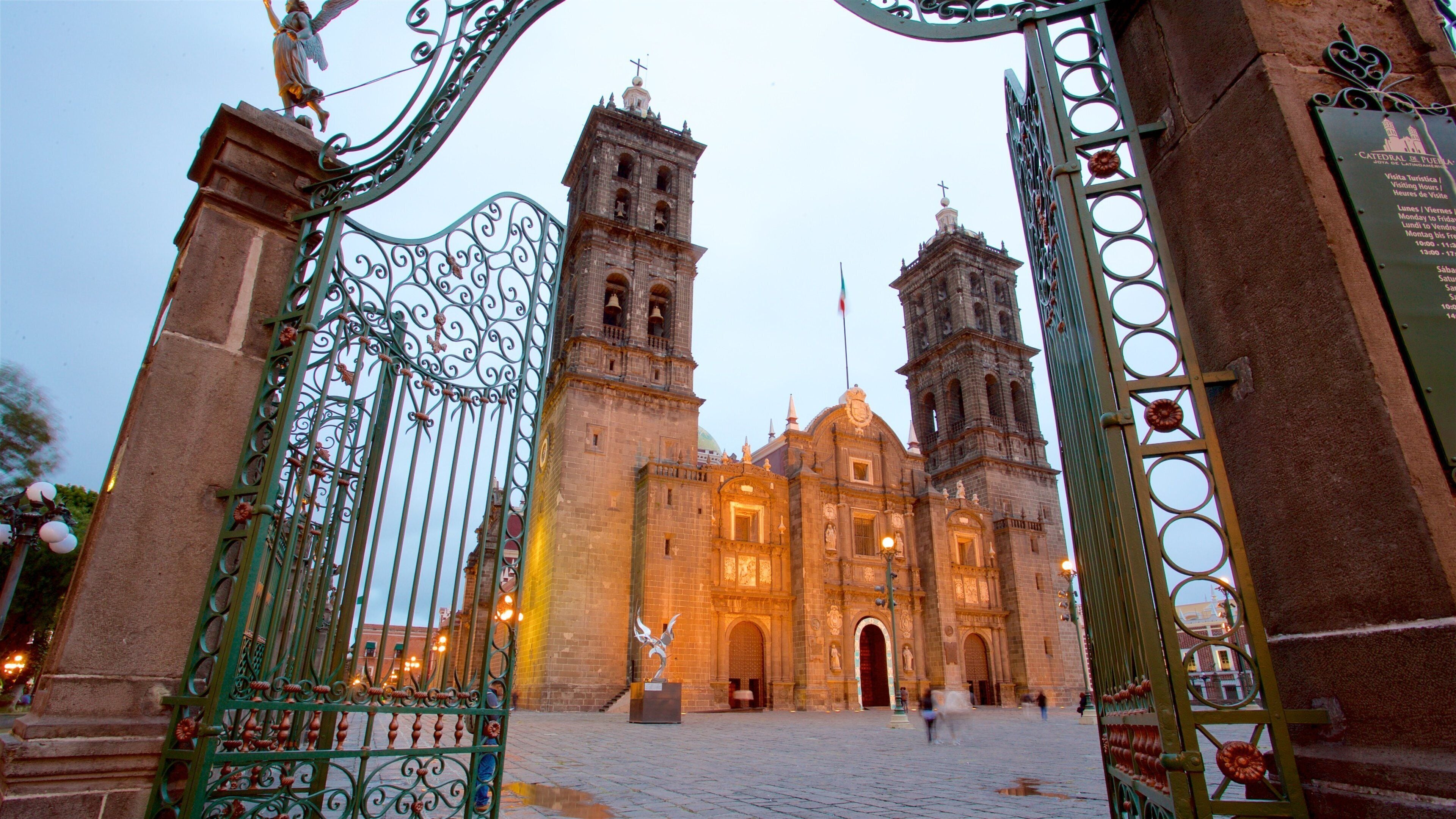 Puebla Cathedral featuring a church or cathedral, heritage architecture and a square or plaza