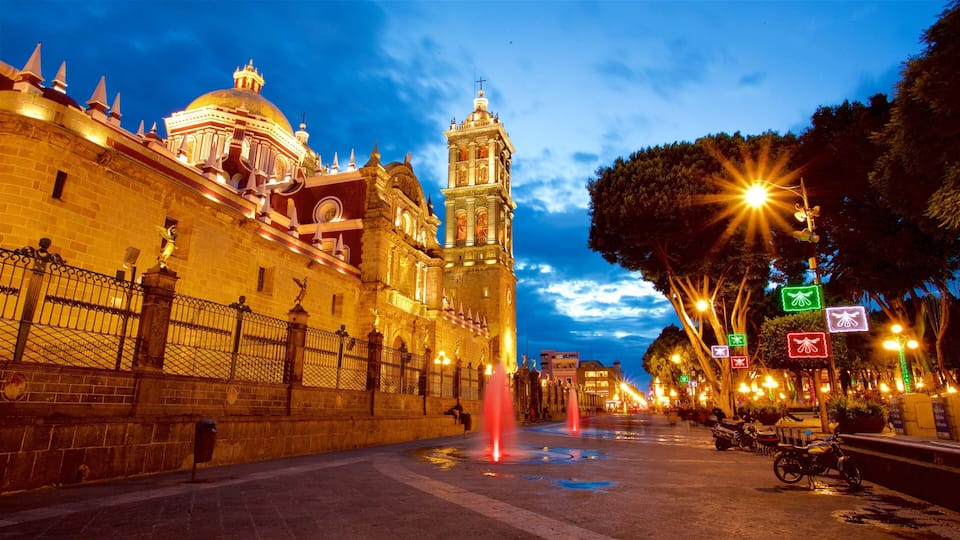Puebla Cathedral which includes heritage architecture, a church or cathedral and a fountain