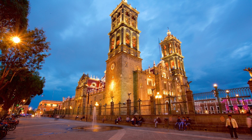 Puebla Cathedral showing heritage architecture, night scenes and a church or cathedral