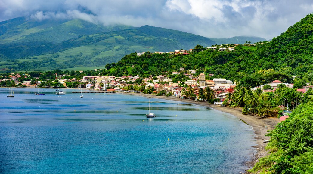 Paradise coast at Saint Pierre with Mt. Pelee, active volcanic mountain in Martinique, Caribbean Sea