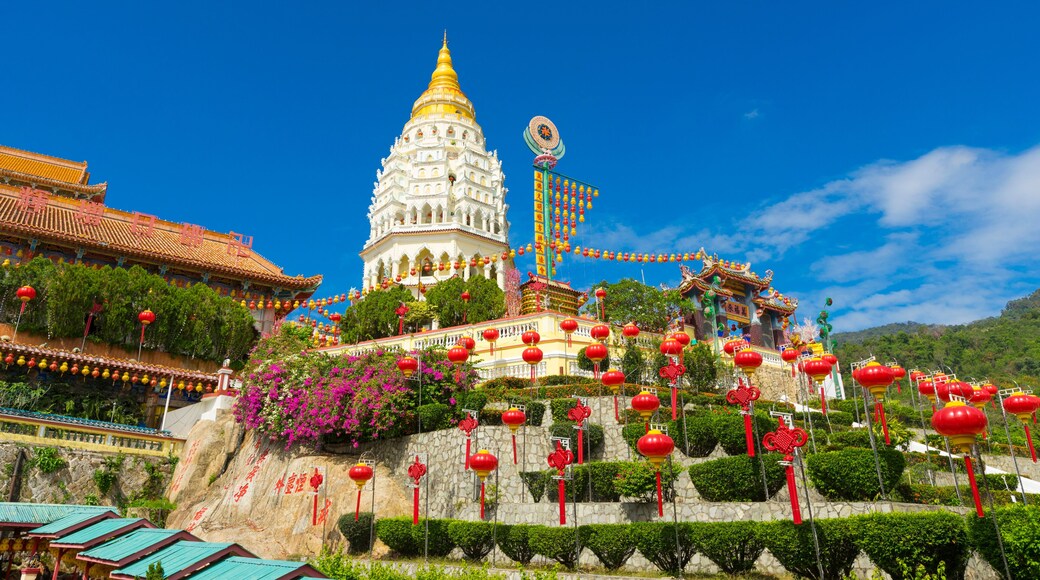 Yellow roof of Kek Lok Si Temple with Penang cityscape in Penang island, Malaysia