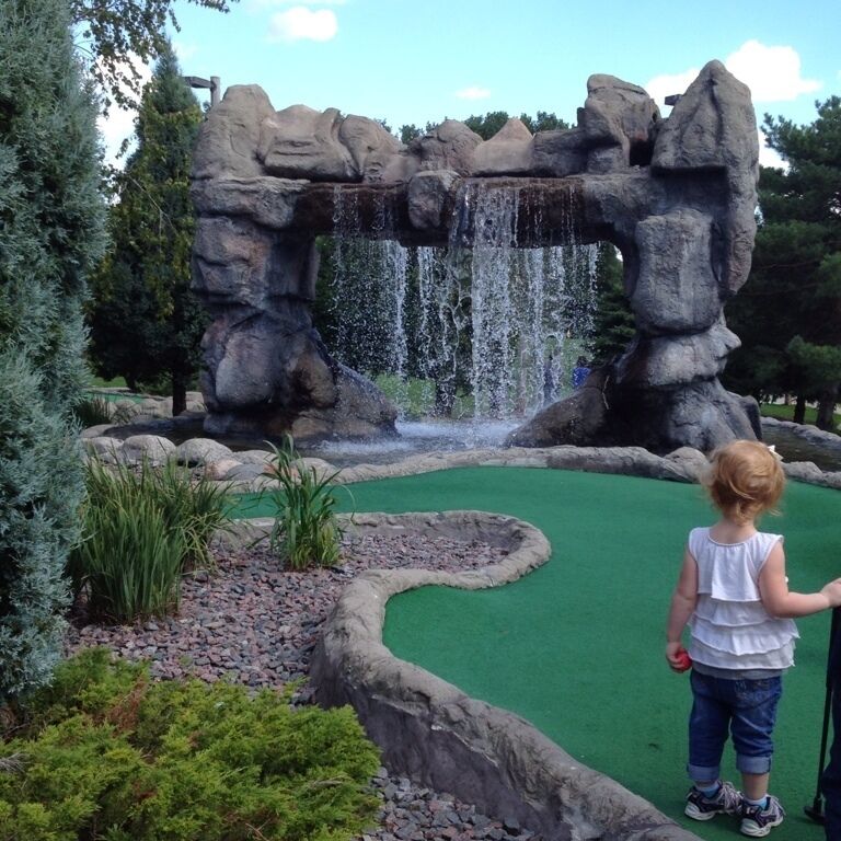 $7.25 adults, under $6 for kiddos and seniors.  18 holes with some handicap accessible.  Good family fun!!
